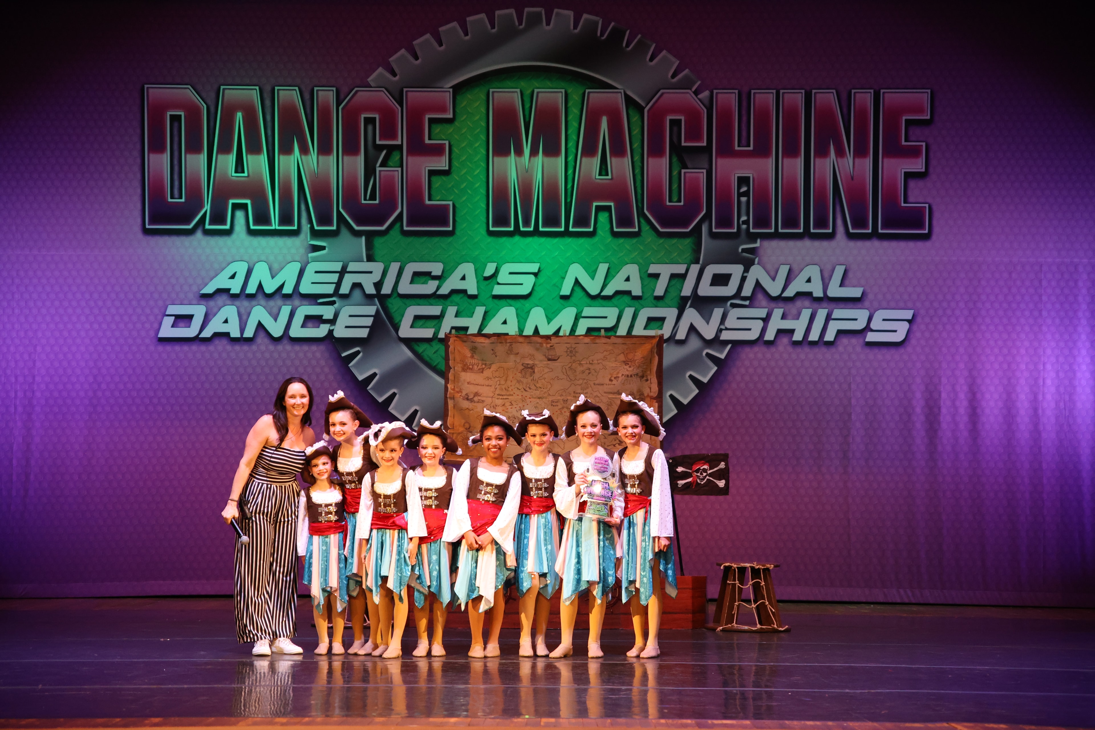 Turn Out Dance Academy dance team and instructor celebrating at Dance Machine