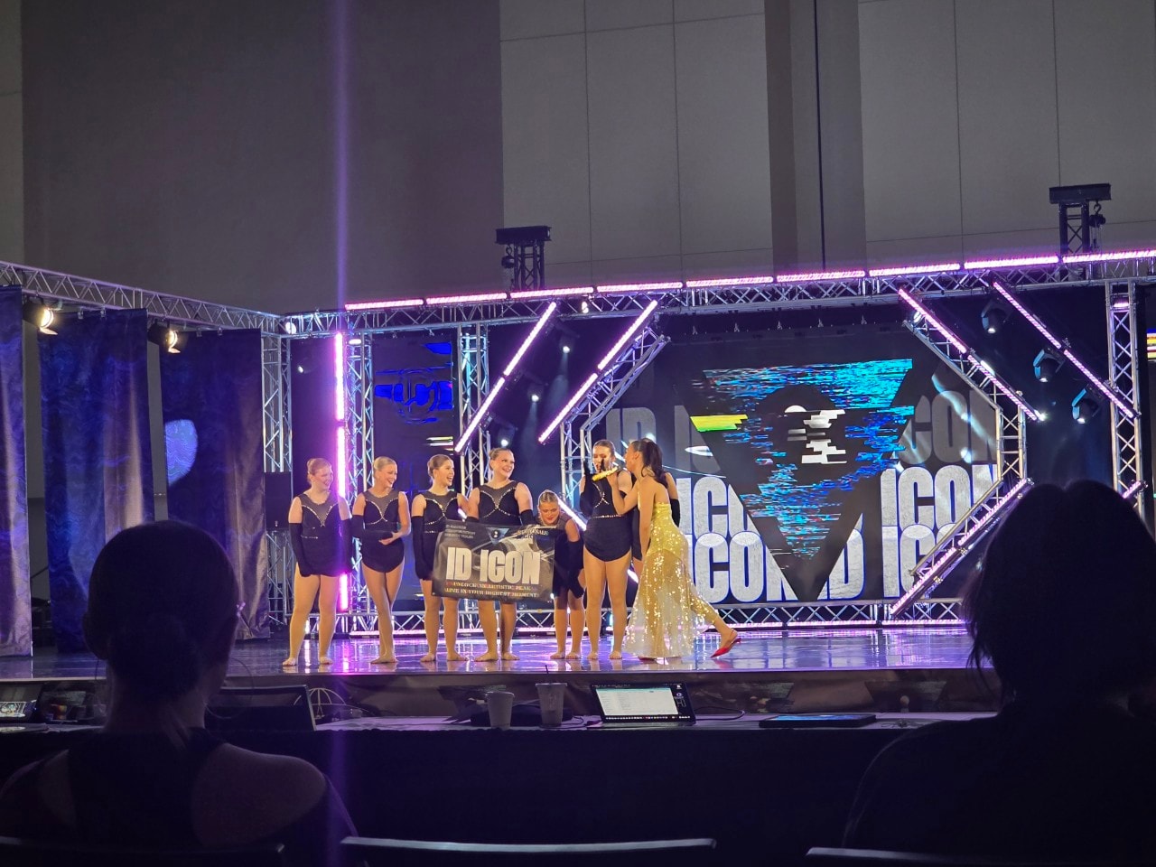 Turn Out Dance Academy dancers receiving a live stage award