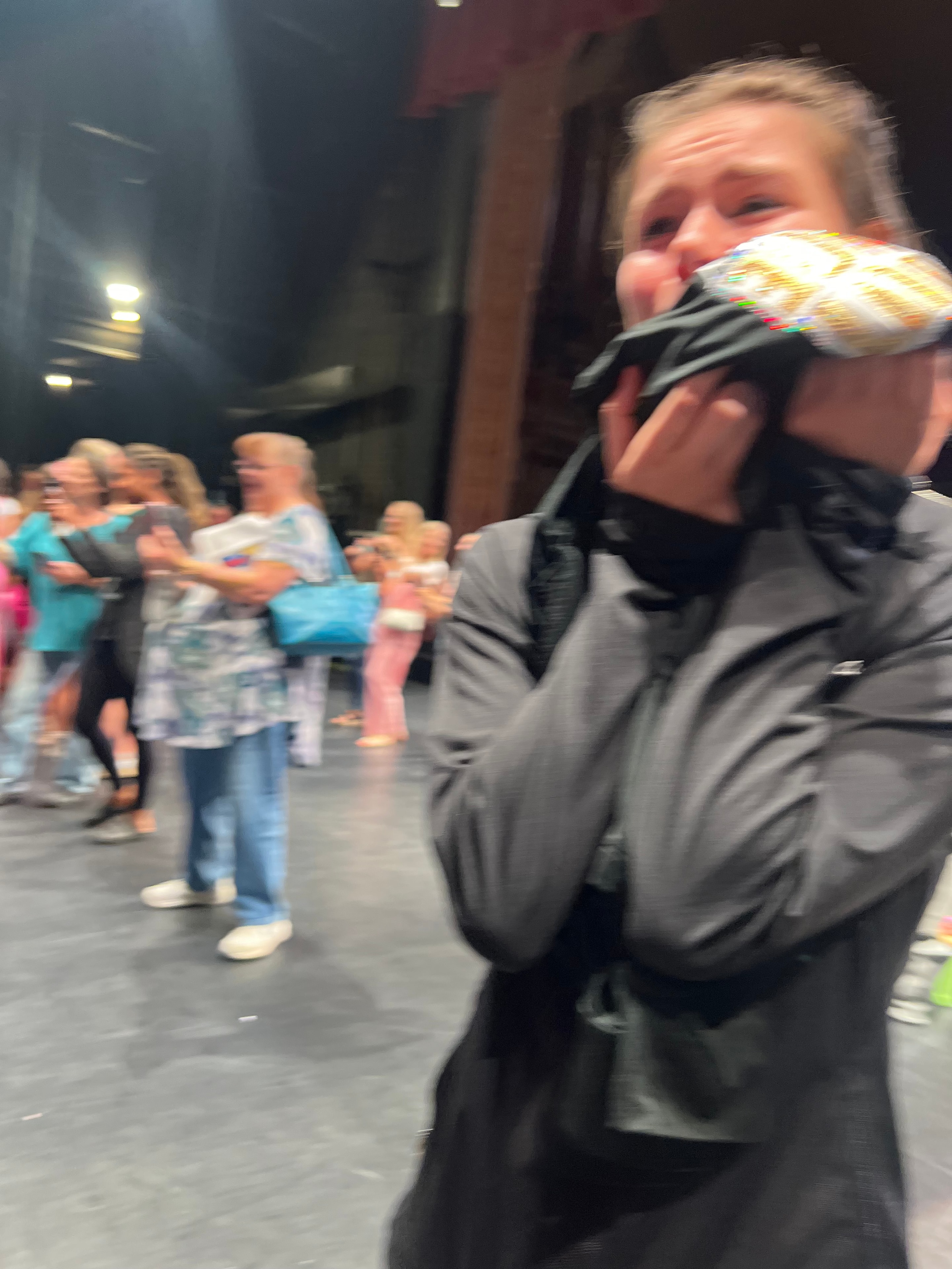 Turn Out Dance Academy performer sharing a colorful candid moment on stage